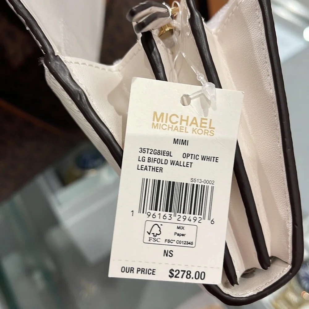 Michael Kors Mimi Large Saffiano Leather Bi-Fold Continental Wallet
Optic White - Picture 15 of 16